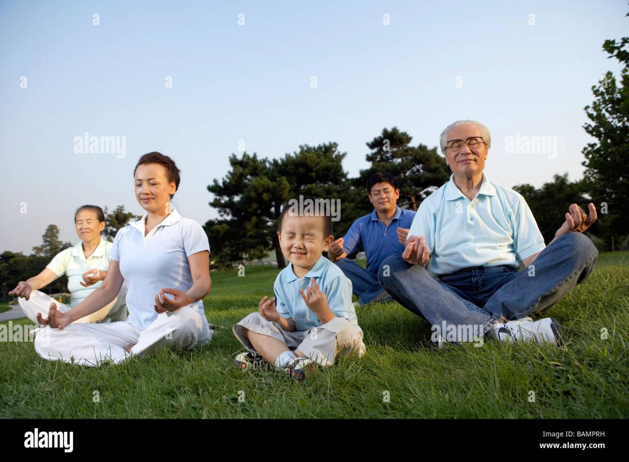 Family Meditate Together Outdoors Stock Photo - Alamy